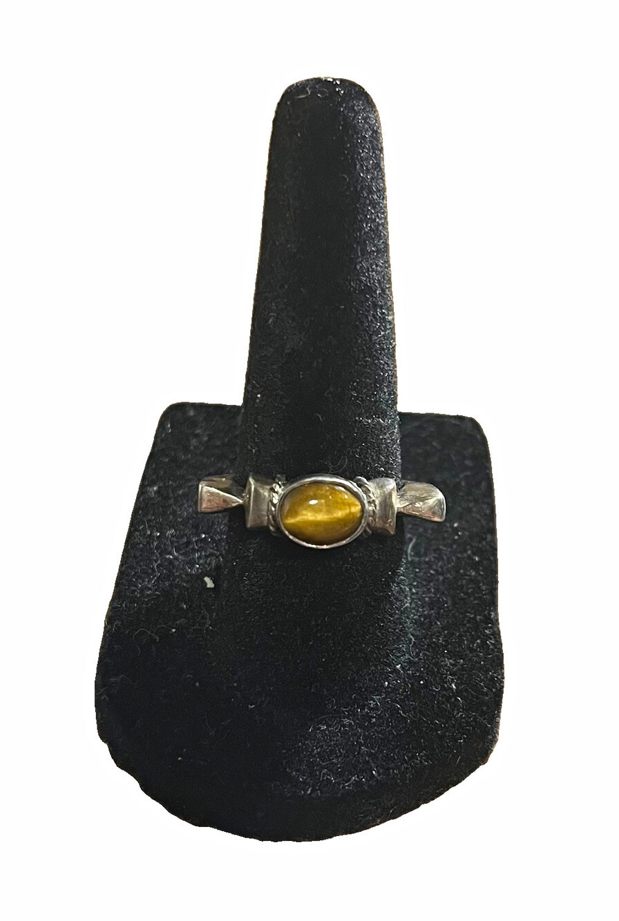 Vintage east/west tigers eye sterling silver ring. Marked . Size 7